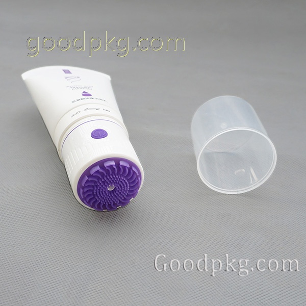 Plastic tube with Electric Vibrating Massager Brush Head for cosmetic